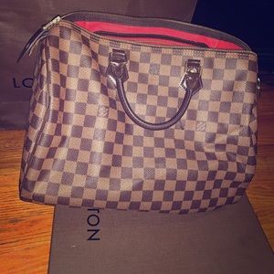 Speedy 35 authentic Louis Vuitton bag.
